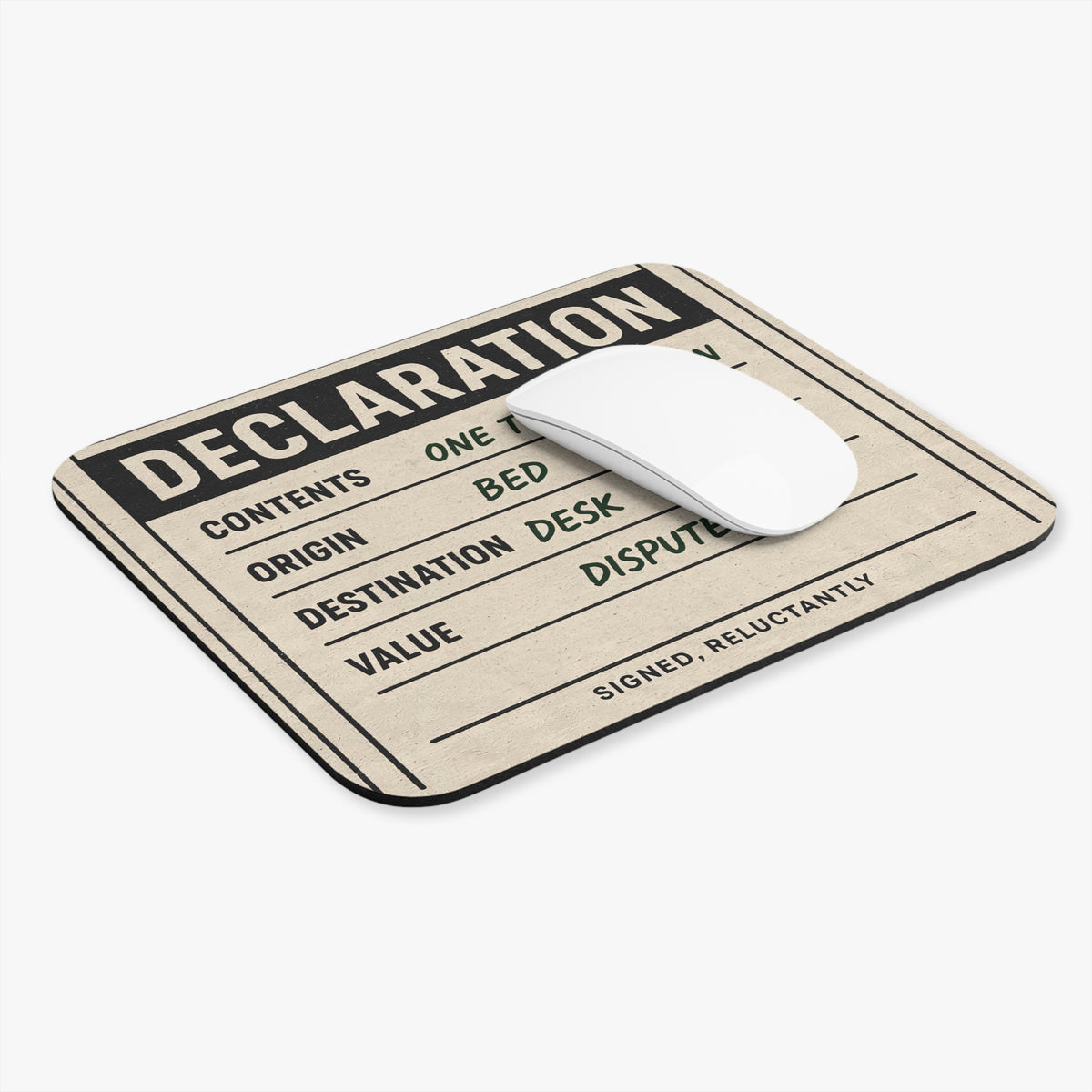 Declaration mouse pad at an angle with a white computer mouse
