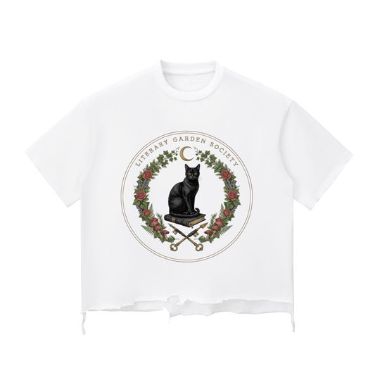 Women’s Literary Garden Society Snow Wash Boxy T-Shirt in white with the black cat and roses crest, front print