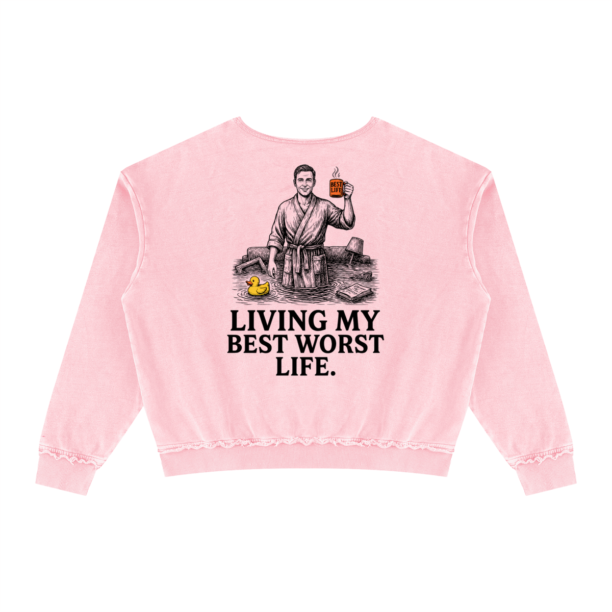 Pink raw edge crewneck sweatshirt with a vintage illustration of a smiling man in a bathrobe raising a mug in a flooded room beside a rubber duck above bold Living my best worst life text on the front
