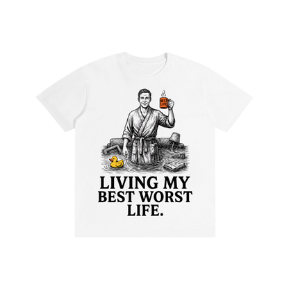 Lucent White cotton crewneck t-shirt with a vintage illustration of a smiling man in a bathrobe raising a mug in a flooded room beside a rubber duck above bold Living my best worst life text on the front