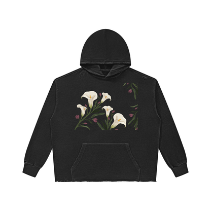 Black calla lily vintage wash raw edge hoodie, front view with white lilies on the chest and kangaroo pocket
