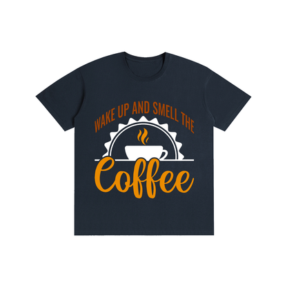 Dark Blue cotton crewneck t-shirt with a rust brown Wake up and smell the coffee design with a white coffee cup and orange cursive Coffee on the front
