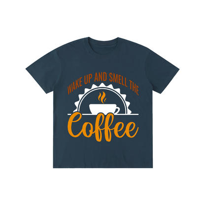 Navy Blue cotton crewneck t-shirt with a rust brown Wake up and smell the coffee design with a white coffee cup and orange cursive Coffee on the front