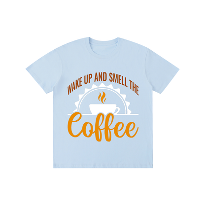 Sky Blue cotton crewneck t-shirt with a rust brown Wake up and smell the coffee design with a white coffee cup and orange cursive Coffee on the front