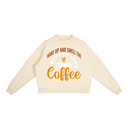 Cream Apricot oversized fleece mock neck sweatshirt with a rust brown Wake up and smell the coffee design with a white coffee cup and orange cursive Coffee on the front