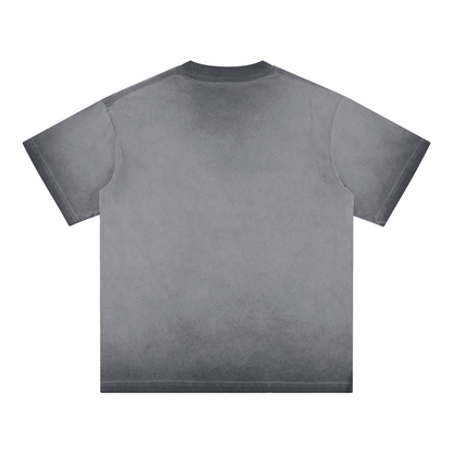 Back view of the reverse dye t-shirt in gray with darker faded edges