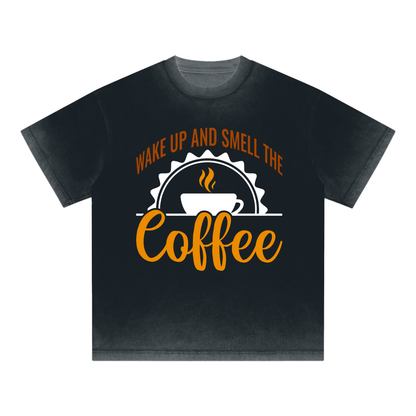 Black reverse dye loose t-shirt with a rust brown Wake up and smell the coffee design with a white coffee cup and orange cursive Coffee on the front