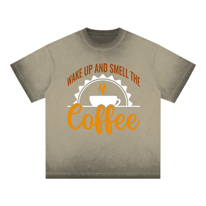Green reverse dye loose t-shirt with a rust brown Wake up and smell the coffee design with a white coffee cup and orange cursive Coffee on the front