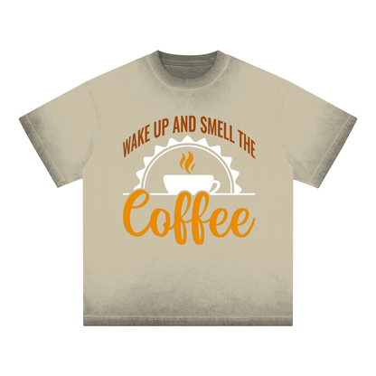 Khaki reverse dye loose t-shirt with a rust brown Wake up and smell the coffee design with a white coffee cup and orange cursive Coffee on the front