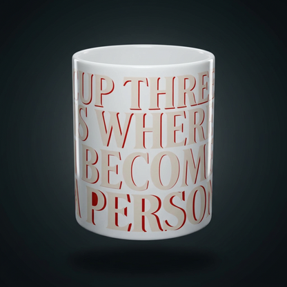 Funny coffee mug printed with "CUP THREE IS WHERE I BECOME A PERSON", shown on a dark studio background