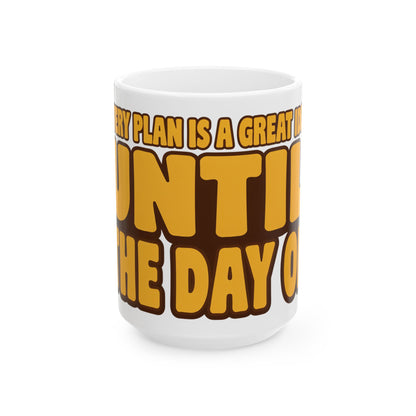Funny coffee mug printed with "EVERY PLAN IS A GREAT IDEA UNTIL THE DAY OF", three-quarter view with the handle on the right