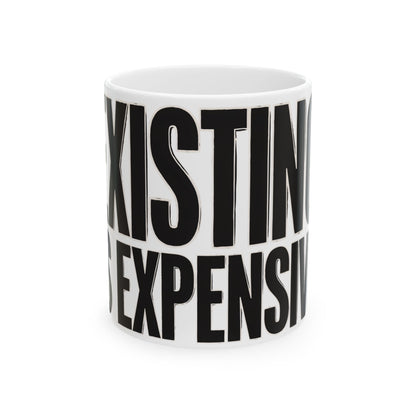 Funny coffee mug printed with "EXISTING IS EXPENSIVE", front view