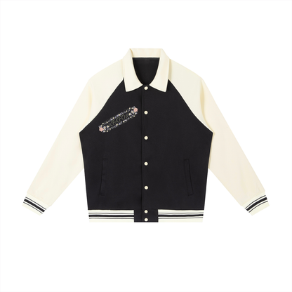 Front of black baseball jacket with cream sleeves and collar, striped ribbed hem and a diagonal band of flowers with FAFO lettering on the chest