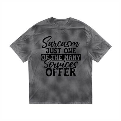 Dark Gray dirty wash loose t-shirt with black cursive and bold capital Sarcasm just one of the many services offer lettering with a black band on the front