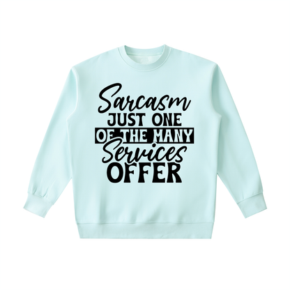 Water Blue heavyweight crewneck sweatshirt with black cursive and bold capital Sarcasm just one of the many services offer lettering with a black band on the front