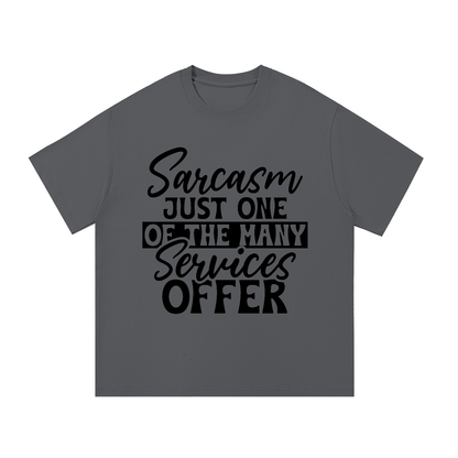 Dark Gray oversized cotton t-shirt with black cursive and bold capital Sarcasm just one of the many services offer lettering with a black band on the front