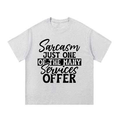 White Gray oversized cotton t-shirt with black cursive and bold capital Sarcasm just one of the many services offer lettering with a black band on the front