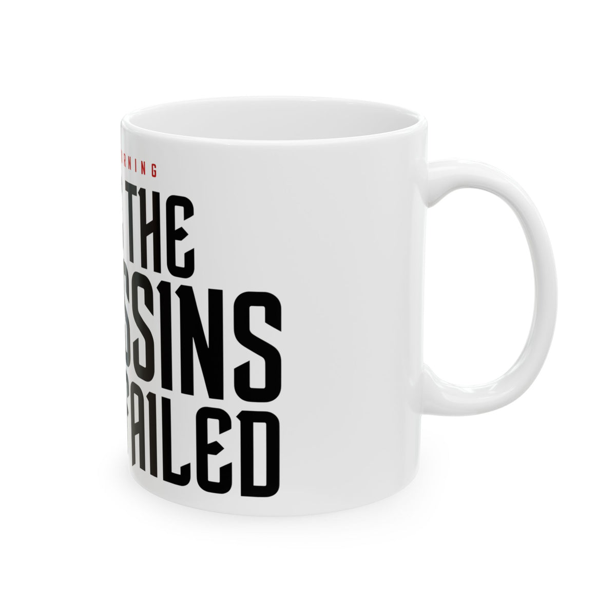 Funny coffee mug printed with "GOOD MORNING / I SEE THE ASSASSINS HAVE FAILED", right side view