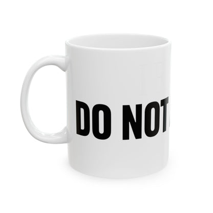 Funny coffee mug printed with "I FIXED IT / DO NOT ASK HOW", left side view