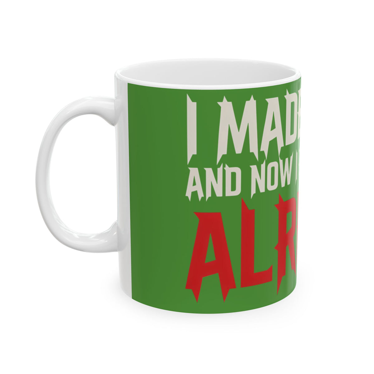 Funny coffee mug printed with "I MADE PLANS AND NOW I REGRET THEM ALREADY", left side view