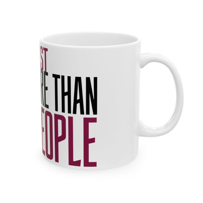 Funny coffee mug printed with "I TRUST COFFEE MORE THAN MOST PEOPLE", right side view