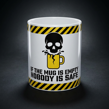 Funny coffee mug printed with "IF THE MUG IS EMPTY NOBODY IS SAFE", shown on a dark studio background