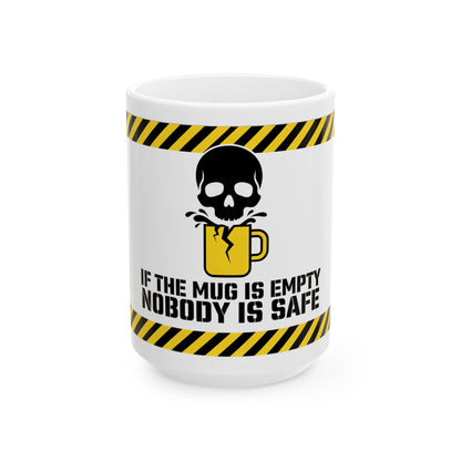 Funny coffee mug printed with "IF THE MUG IS EMPTY NOBODY IS SAFE", three-quarter view with the handle on the right