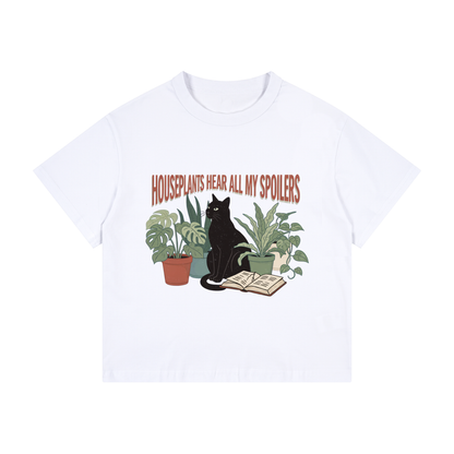 Kids’ loose-fit drop-shoulder tee with a black cat beside houseplants and an open book, Houseplants Hear All My Spoilers front print