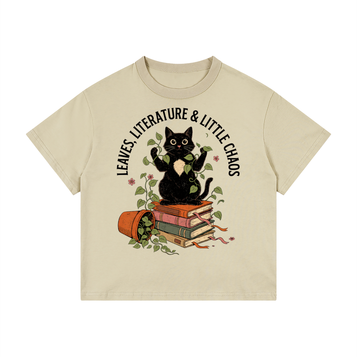 Kids’ loose-fit drop-shoulder tee with a black cat on books beside a tipped plant pot, Leaves, Literature & Little Chaos front print