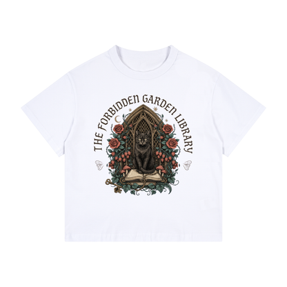 Kids’ loose-fit drop-shoulder tee with a black cat in a gothic garden library doorway, The Forbidden Garden Library front print