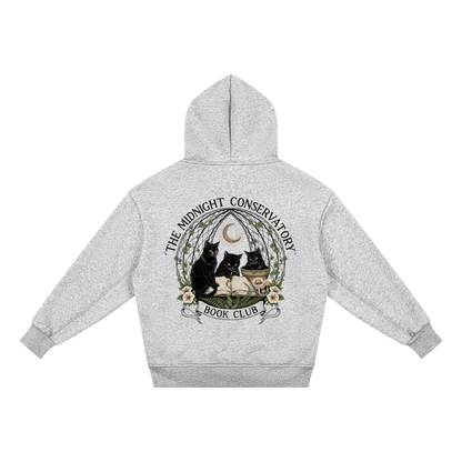 Kids’ fleece hoodie with black cats under a crescent moon at a midnight book club, The Midnight Conservatory Book Club back print