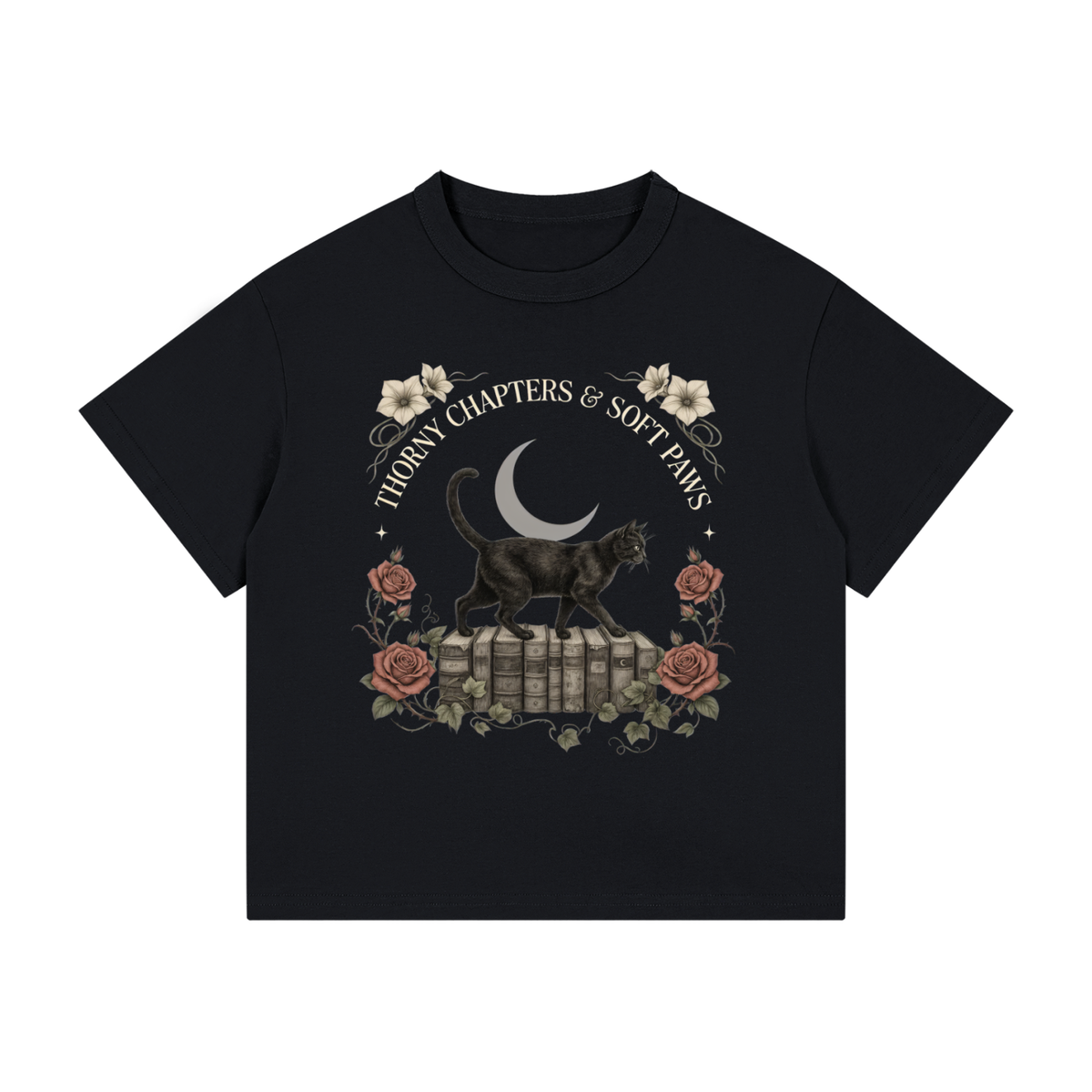 Kids’ loose-fit drop-shoulder tee with a black cat walking over old books under a crescent moon, Thorny Chapters & Soft Paws front print