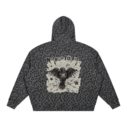Black leopard print hoodie, back view with a crow gripping barbed wire and NOTHING TO LOSE on a torn paper scrap