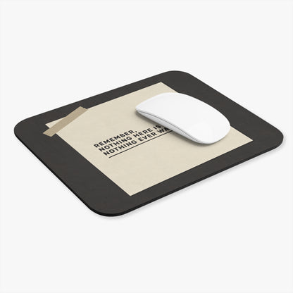 Nothing is urgent mouse pad at an angle with a white computer mouse