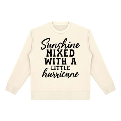 Apricot heavyweight fleece crewneck sweatshirt with black cursive and bold capital Sunshine mixed with a little hurricane lettering on the front