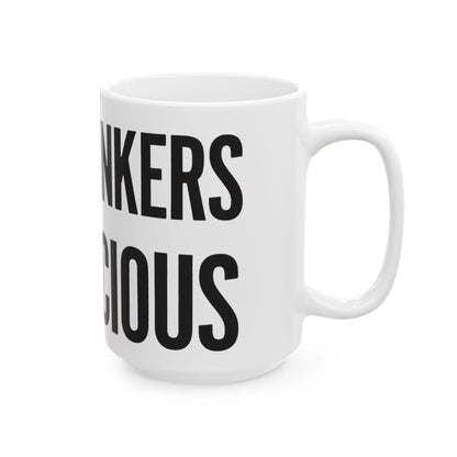 Funny tea mug printed with "TEA DRINKERS ARE SUSPICIOUS", 15 oz size, right side view