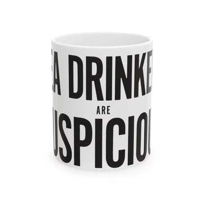 Funny tea mug printed with "TEA DRINKERS ARE SUSPICIOUS", front view