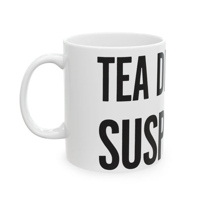 Funny tea mug printed with "TEA DRINKERS ARE SUSPICIOUS", left side view