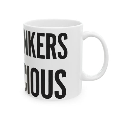 Funny tea mug printed with "TEA DRINKERS ARE SUSPICIOUS", right side view