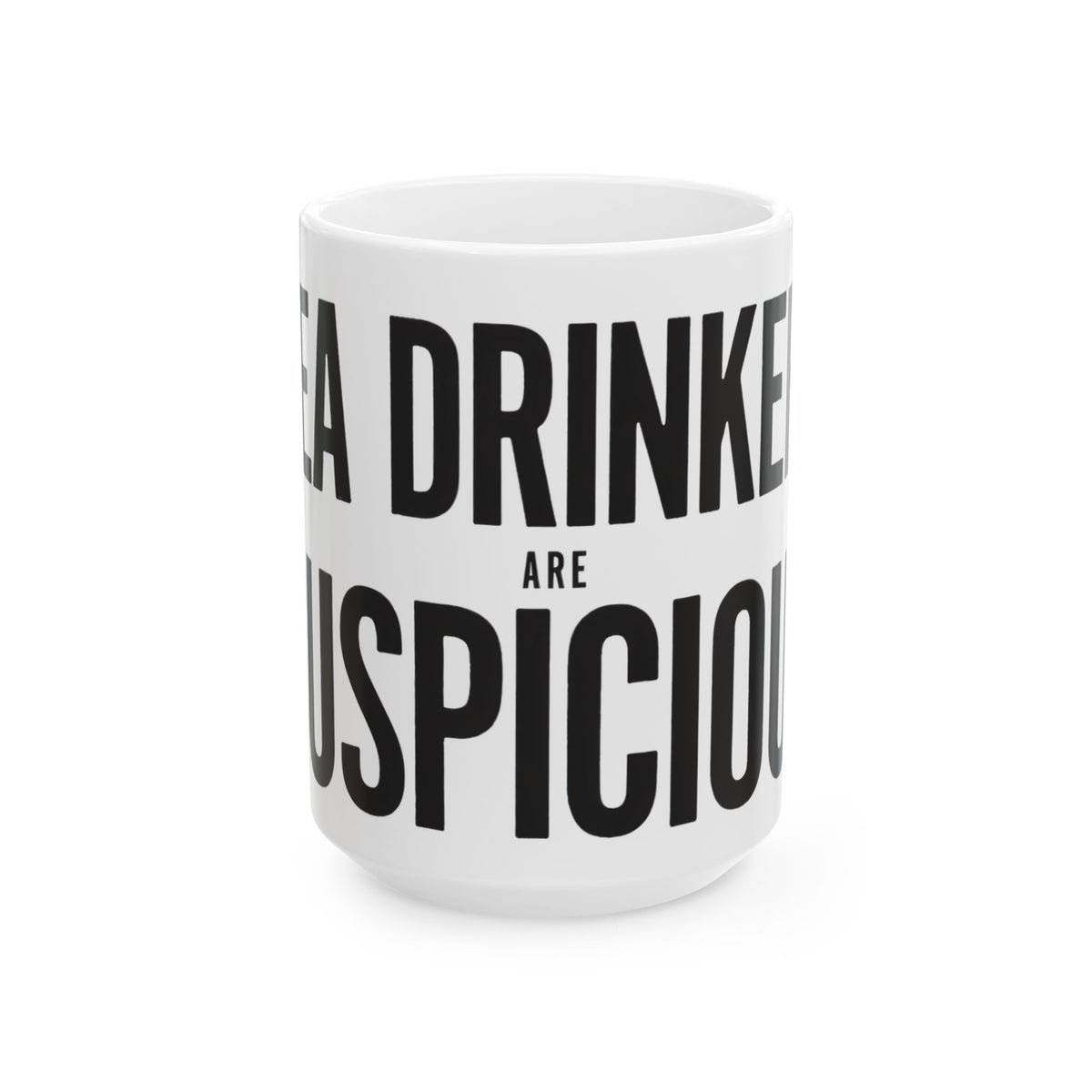 Funny tea mug printed with "TEA DRINKERS ARE SUSPICIOUS", three-quarter view with the handle on the right