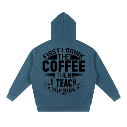 Haze Blue oversized boxy fleece hoodie with black First I drink the coffee then I teach the kids lettering with a star ribbon banner on the back
