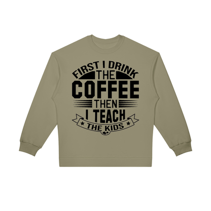 Gray Green oversized crewneck sweatshirt with black First I drink the coffee then I teach the kids lettering with a star ribbon banner on the front