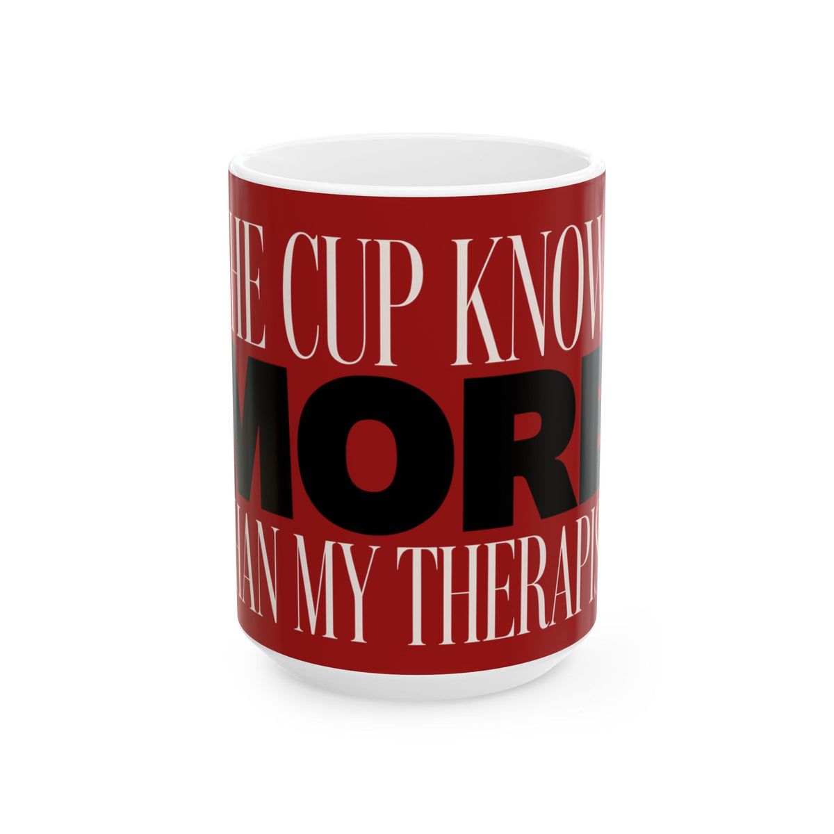 Funny coffee mug printed with "THE CUP KNOWS MORE THAN MY THERAPIST", three-quarter view with the handle on the right