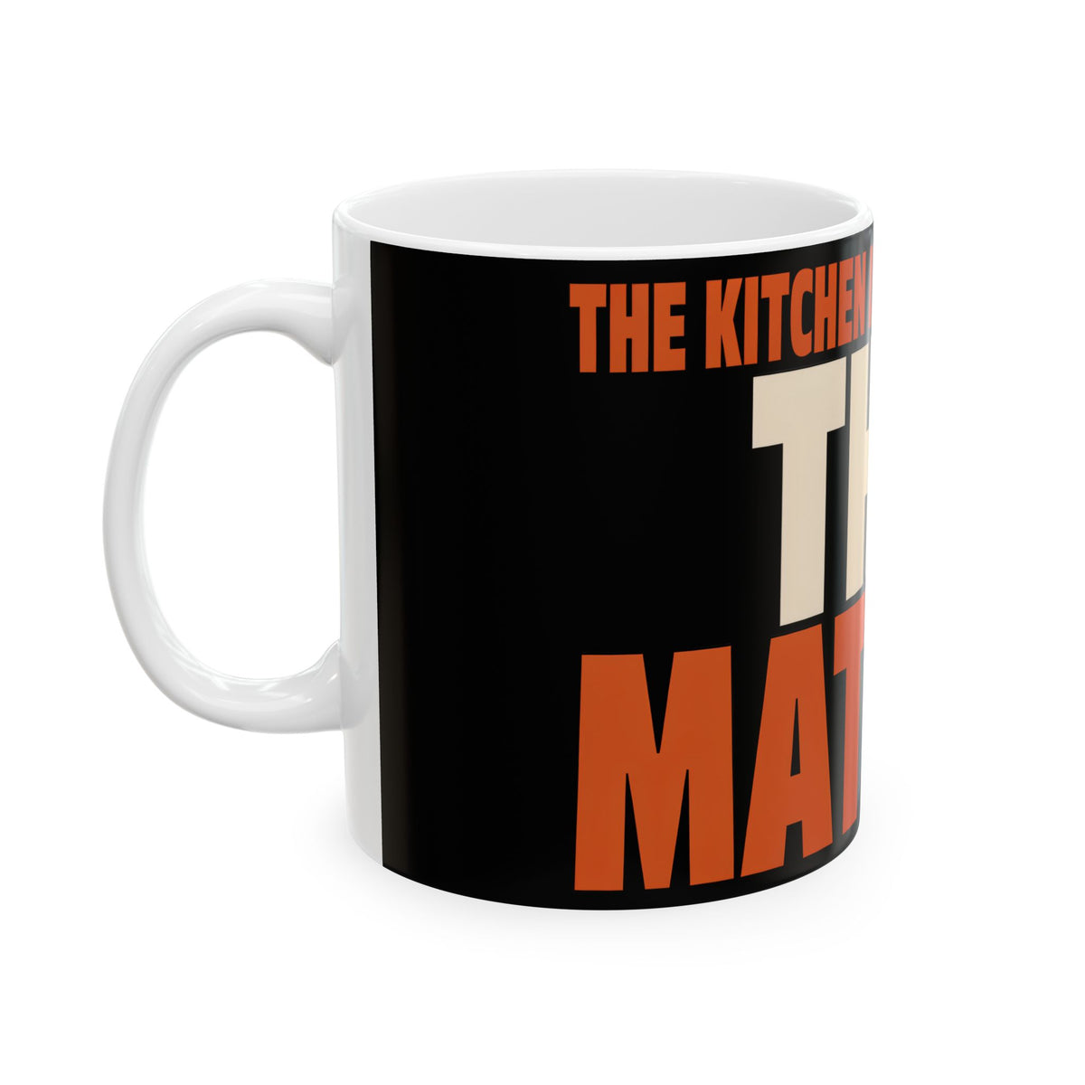 Funny coffee mug printed with "THE KITCHEN IS THE ONLY ROOM THAT MATTERS", left side view