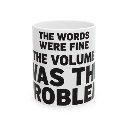 Funny coffee mug printed with "THE WORDS WERE FINE THE VOLUME WAS THE PROBLEM", front view