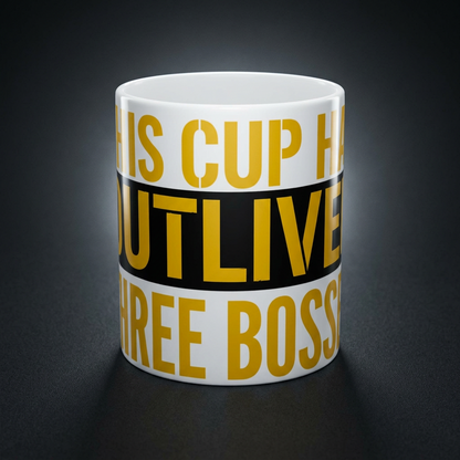 Funny coffee mug printed with "THIS CUP HAS OUTLIVED THREE BOSSES", shown on a dark studio background