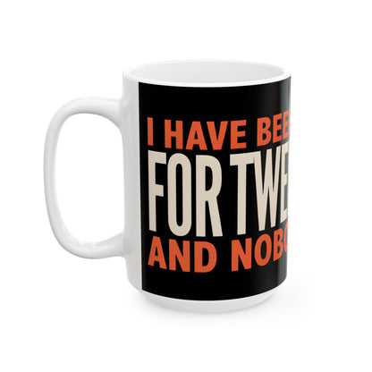 Funny coffee mug printed with "I HAVE BEEN FAKING THIS FOR TWENTY YEARS AND NOBODY NOTICED", 15 oz size, left side view