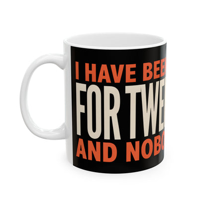 Funny coffee mug printed with "I HAVE BEEN FAKING THIS FOR TWENTY YEARS AND NOBODY NOTICED", front view