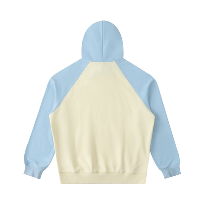 Unisex Color-Block Raglan Sleeve Hoodie in mild apricot with sky blue, alternate angle