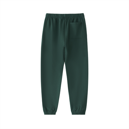 Unisex Essential Heavyweight Cotton Sweatpants in retro green, alternate angle